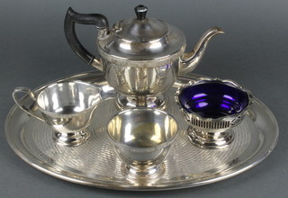 A silver plated 3 piece tea set, a ditto sugar bowl and tray