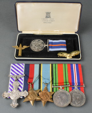 A group of 5 medals to 45945 Acting Squadron Leader C D Owen, 162 Sqn RAF, comprising George VI Distinguished Flying Cross dated 1945, 1939-45 Star, Air Crew Europe Star, Defence and War medal and Bomber Command medal and a Pathfinder Badge, NB born 16/12/14, commissioned 22/5/41