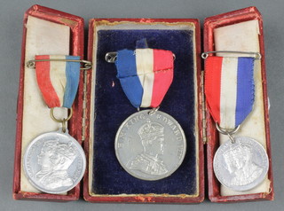 An Edward VIII commemorative Coronation medallion and 2 others 