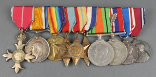 Group, Order of The British Empire Military Issue Second Type 1945, British War medal and Victory 1939-45, Africa, France and Germany Stars, Defence, War medal with mention in dispatches, George V Silver Jubilee and George VI Coronation medal to 2nd Lieutenant later Group Captain E.N.D. Worsley together with some service records (1/8/18/RAF Equipment Branch F.O. and WWII Recruitment Branch/Coastal Command)