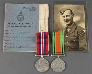 Second World War Defence medal to T.M.Jones with RAF Service release book, photo, 1 other photo and a War medal 
