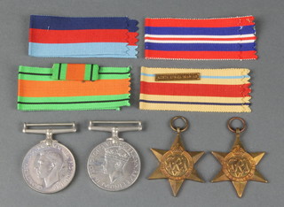 Group 1939-45 and Africa Stars, Defence and War Medal, 42-43 North Africa clasp,  in posting box to Flt Lt. R.E.Lunn