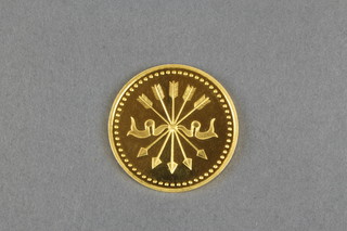 A 14ct gold commemorative medallion marking the bicentenary of the Foundation of H M Rothschild & Sons, 11 grams, boxed