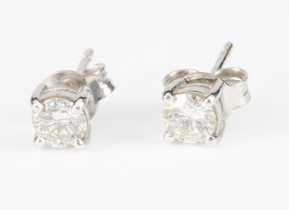 A pair of 18ct white gold diamond ear studs, approx. 0.65ct 