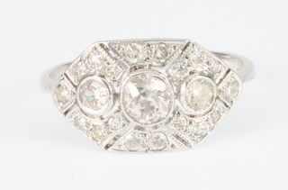 An 18ct white gold Art Deco style 20 stone diamond ring, size N 1/2, 0.8ct 