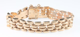 A stylish 9ct gold hollow link bracelet, 30 grams