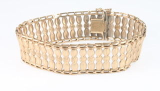 A 9ct gold fancy link wide bracelet, 12.5 grams 