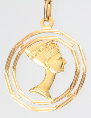 An 18ct yellow gold Egyptianesque open pendant on a ditto chain, 13 grams