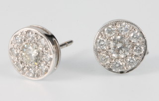 A pair of 18ct white gold 9 stone diamond target ear studs, approx 0.7ct 