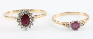A 9ct yellow gold ruby cluster ring, size S, a 3 stone ditto size M