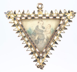 An 18th Century Continental gilt and enamelled triangular pendant with a watercolour study of a monk and a boy child 