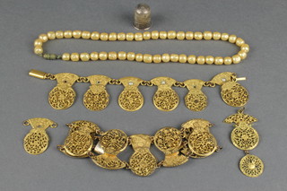 2 gilt bracelets and a pair of gilt earrings made from watch movement cocks a thimble and necklace