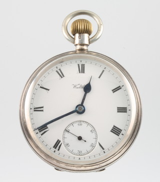 A silver engine turned mechanical pocket watch with seconds at 6 o'clock inscribed Waltham