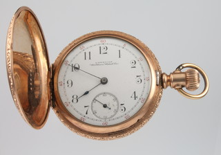A gentleman's fancy gilt cased hunter pocket watch with seconds at 6 o'clock and red 5 minute markers, inscribed Waltham Watch Company 