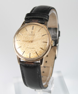 A gentleman's gold plated Omega automatic Seamaster wristwatch on a leather strap 