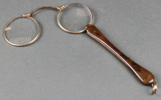 A pair of gold mounted pince nez with tortoiseshell grip 