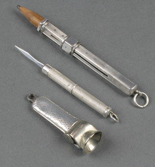 A silver engine turned propelling pencil, ditto cigar cutter and a tooth pick