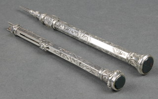 An Edwardian silver propelling dip pen, a ditto propelling pencil with hardstone end 