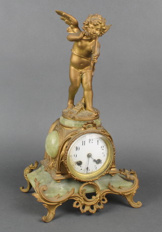A 19th Century French striking mantel clock with enamelled dial and Arabic numerals contained in an onyx and gilt metal mounted case surmounted by a figure of a standing cupid