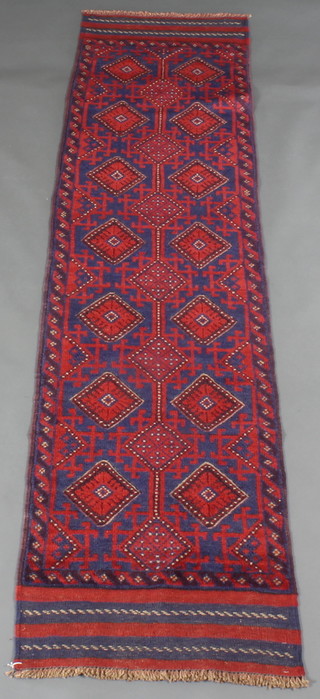 A contemporary red and blue ground Meshwani runner 101" x 24" 
 