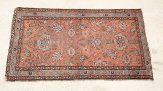 A Persian Brojerd red ground rug 72" x 40"  
