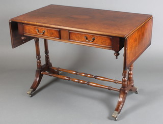 A Georgian style figured walnut sofa table fitted 2 long frieze drawers, raised on 4 turned supports with H framed stretcher and splayed feet 29"h x 40" when closed by 59" when open 