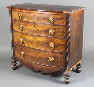 A Channel Islands William IV mahogany bow front chest of 4 long drawers with cross banded top and carved column decoration to the sides, 39"h x 41"w x 20"d 