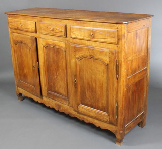 An 18th/19th Century French cherry dresser base, the upper section with plate rail fitted 3 long drawers above double cupboard and raised on shaped supports 45"h x 65"w x 19 1/2"d 