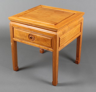 A Chinese light Padouk lamp table fitted a frieze drawer and raised on square supports 22"h x 20"w x 20"d 