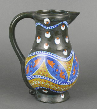 A Gouda baluster jug with scrolling floral decoration marked Massa Zuid/Holland 1723 8 1/2" 