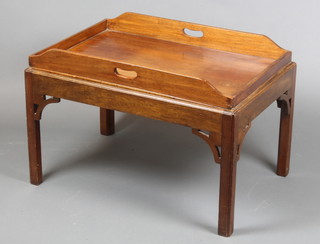 A 19th Century rectangular mahogany twin handled butler's tray, raised on an associated later base 20"h x 30 1/2"w x 20 1/2"d  
