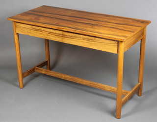 A 1970's Danish rosewood side table fitted 2  drawers raised on turned supports with H framed stretcher 28"h x 45"w x 21"d 