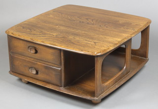 A 1960's Ercol style dark elm square coffee table, the base fitted 2 drawers and with recesses 32"h x 31 1/2" square 