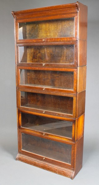 An oak 6 tier Globe Wernicke style bookcase 78"h x 34"w x 11 1/2"d 