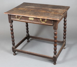 An 18th Century rectangular oak side table fitted a drawer, raised on turned supports with brass swan neck drop handles 29"h x 33 1/2"w x 24"d  
