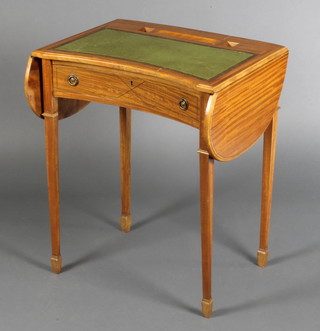 An Edwardian inlaid mahogany drop flap kidney shaped writing table with green inset writing surface, pen and inkwell recesses, fitted a frieze drawer and raised on square tapering supports, spade feet 28"h x 23"w when closed x 41" when extended x 17"d 