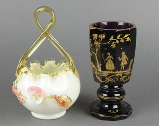 A Continental amethyst glass gilt decorated faceted goblet with a fete galant scene 6" and a Victorian 2 colour glass basket 7" 