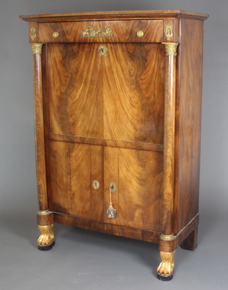 A 19th Century French mahogany escritoire with secretaire fall front above a double cupboard with columns to the sides, raised on paw feet 61"h x 41"w x 21"d 