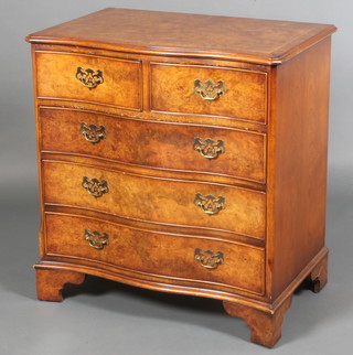 A Queen Anne style walnut chest of serpentine outline with crossbanded inlaid top, fitted 2 short and 3 long drawers, raised on bracket feet 31"h x 29"w x 18"d 