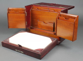 A Victorian stationery box/writing slope covered in red leather 10"h x 12"w x 5 1/2"d 