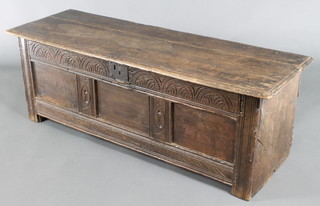 An 18th Century carved oak coffer of panelled construction with iron lock plate 17"h x 48"w x 16"d 