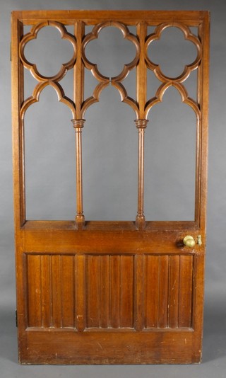 Sections of 19th Century carved oak Gothic tracery panelling  comprising 2 doors in 4 sections together with 2 linen fold panels and a balustrade, the first section of tracery, the 2 doors measure 78", 83 1/2" together and 41 1/2" separately, 1 section of screening that is 79"h x 82", 3 sections are 79"h x 30"w, section of balustrade is 30"h x 73"w and 2 sections of linen fold panelling are 69"h x 30 1/2"   
