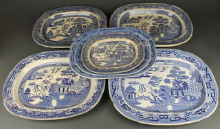 Seven Victorian Willow Pattern meat plates of varying sizes