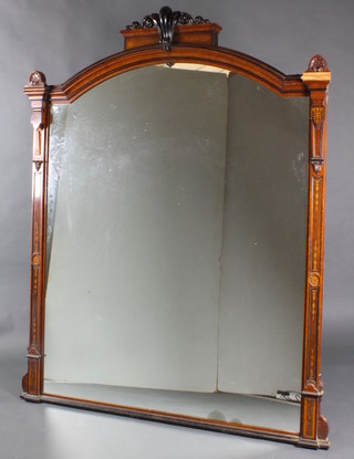 A Victorian arched plate over mantel mirror contained in an inlaid figured walnut frame 76"h x 61"w 