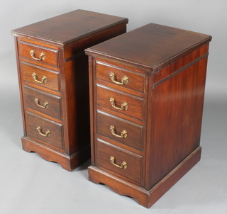 A pair of mahogany pedestal chests fitted 4 long drawers with brass swan neck drop handles and brass escutcheons 30"h x 16"w x 23"d  