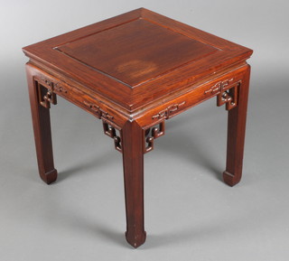 A square Chinese Padouk wood jardiniere stand with carved and shaped apron, raised on square tapering supports 20"h x 20"w x 20"d 