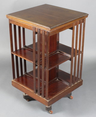 A Victorian square mahogany 2 tier revolving bookcase 36"h x 20"w x 20"d 
