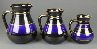 A set of three Victorian graduated jugs