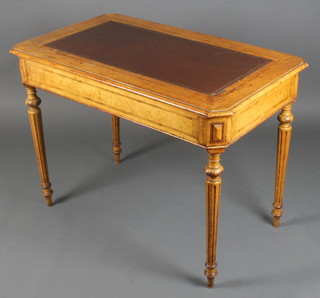 A Victorian Continental satinwood library table with inset and crossbanded top, fitted a drawer raised on turned and fluted supports 29"h x 39 1/2"w x 24"d 