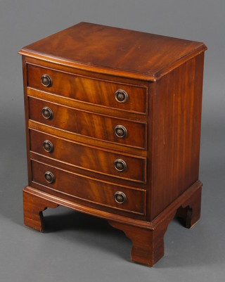 A Georgian style mahogany bow front chest of 4 long drawers, raised on bracket feet 23" x 18" x 13"